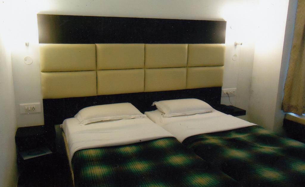 Hotel New Rajdarshan ماديكيري الغرفة الصورة